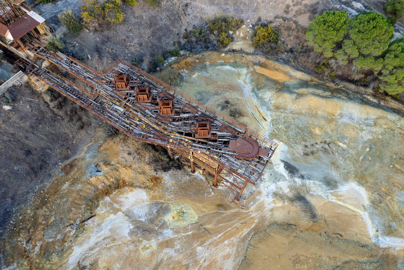 Heavy mining machinery working in an open-pit mine, highlighting corrosion engineering, material durability, and equipment protection in demanding industrial conditions.